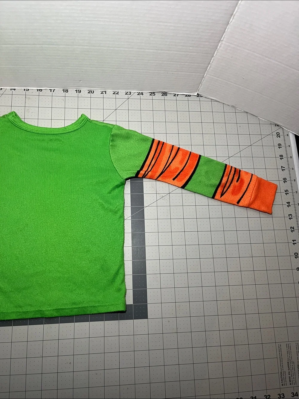 Kids Green Turtle Shell Pajama Top with Orange Sleeve Accents